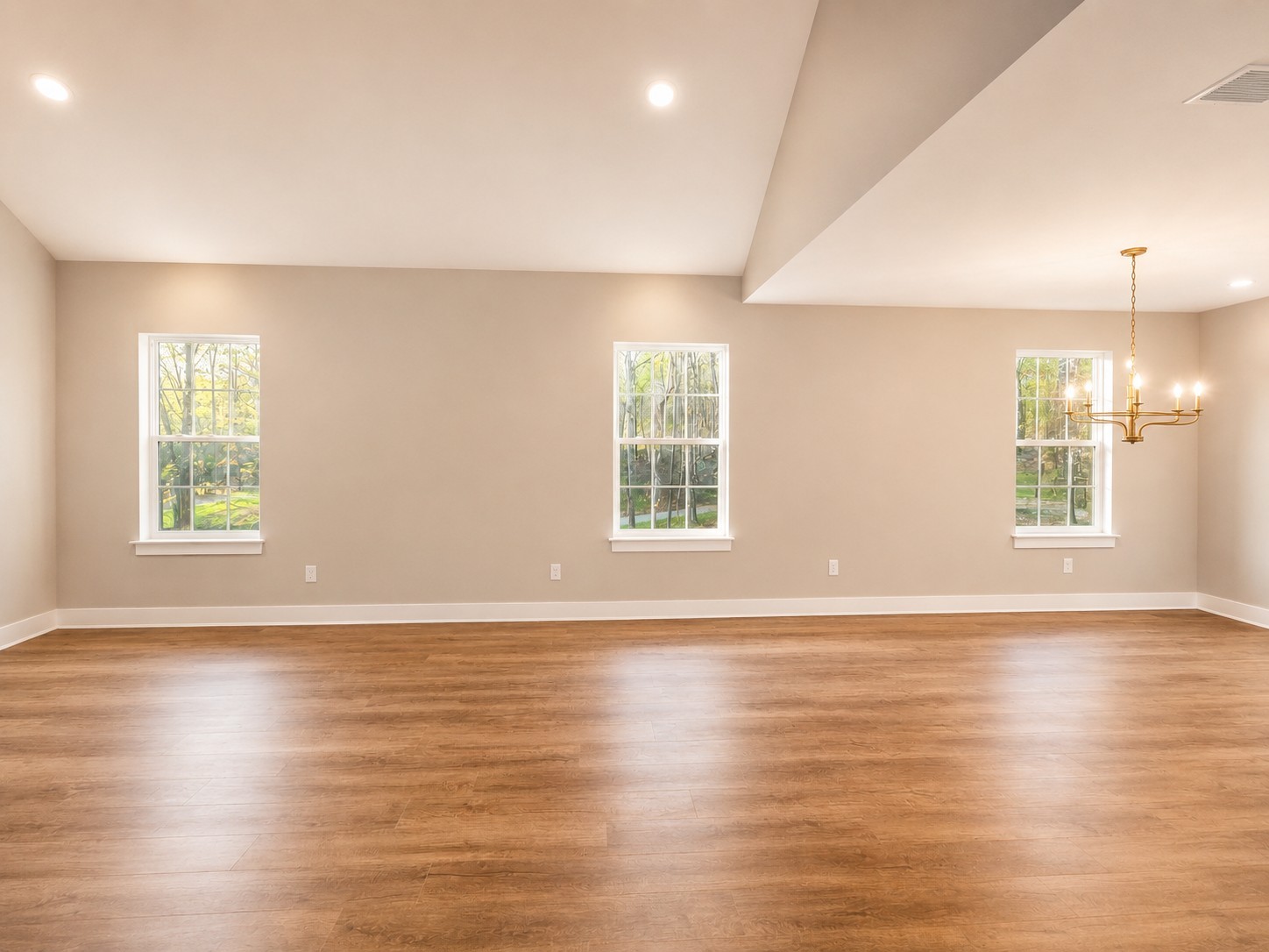 4603 Chapel Hill Road Southside, TN 37171 - Photo 15 of 26 an empty room with wooden floor and windows