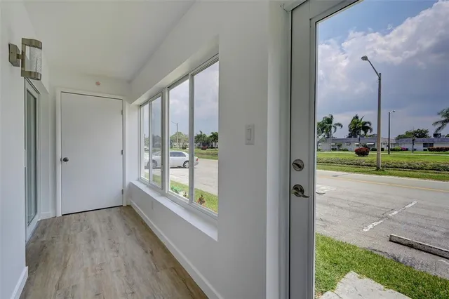 a view of porch with a yard