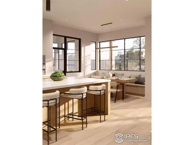 a room with a table chairs and a view of living room