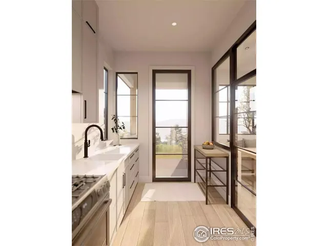 a spacious bathroom with a granite countertop sink and a bathtub