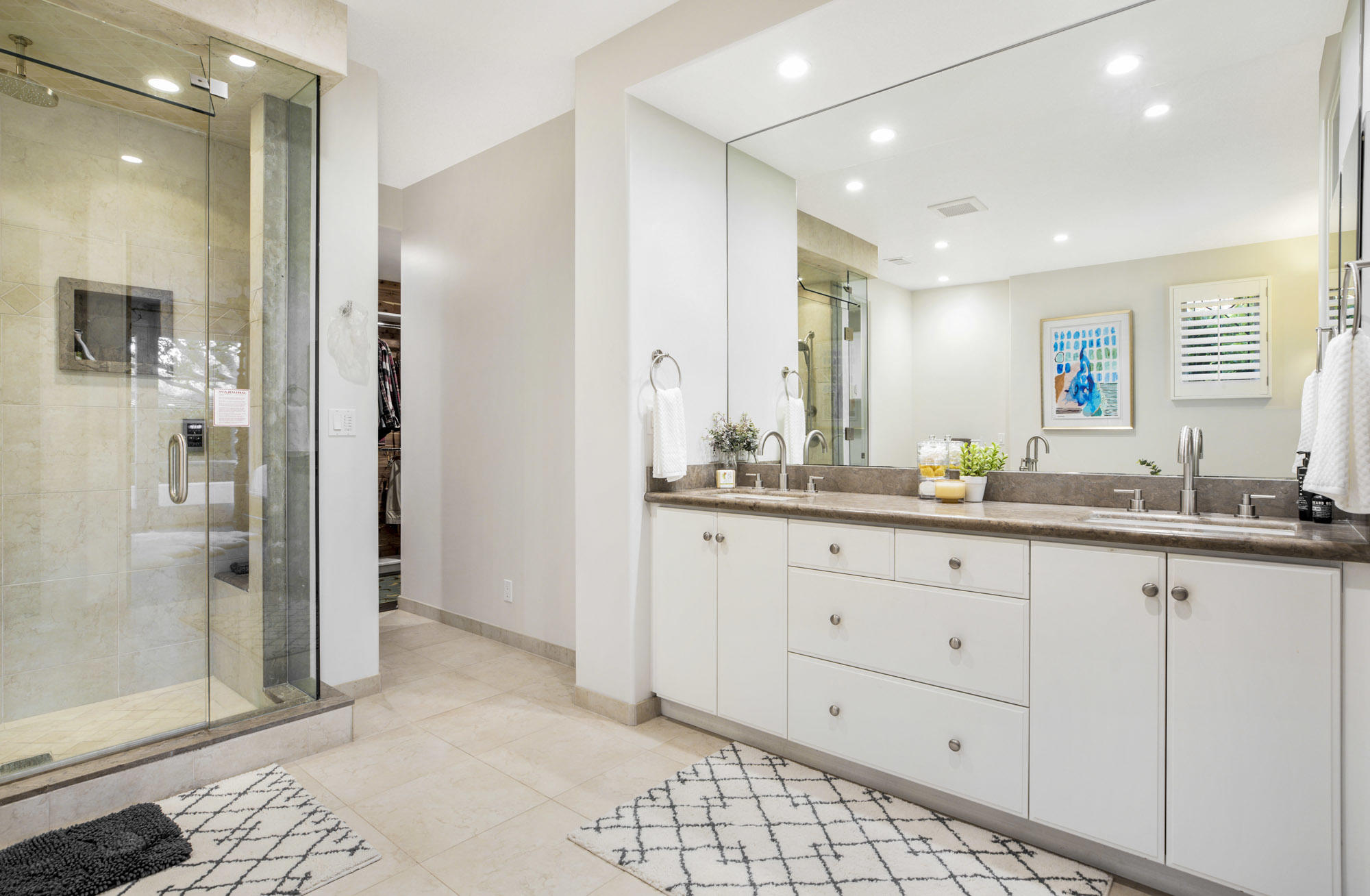 485 Monarch Lane Santa Barbara, CA 93108 - Photo 12 of 24 a bathroom with a double vanity sink and a mirror