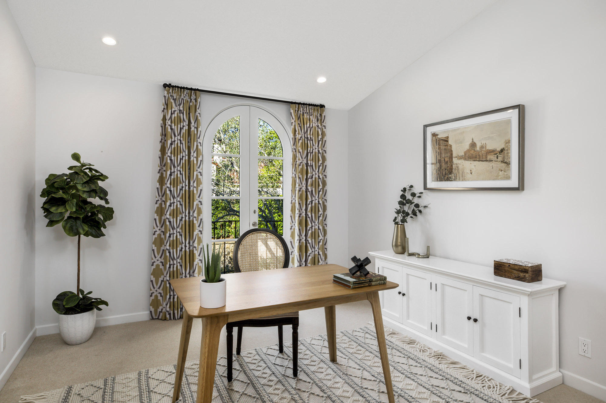 485 Monarch Lane Santa Barbara, CA 93108 - Photo 19 of 24 a view of a workspace with furniture and a potted plant