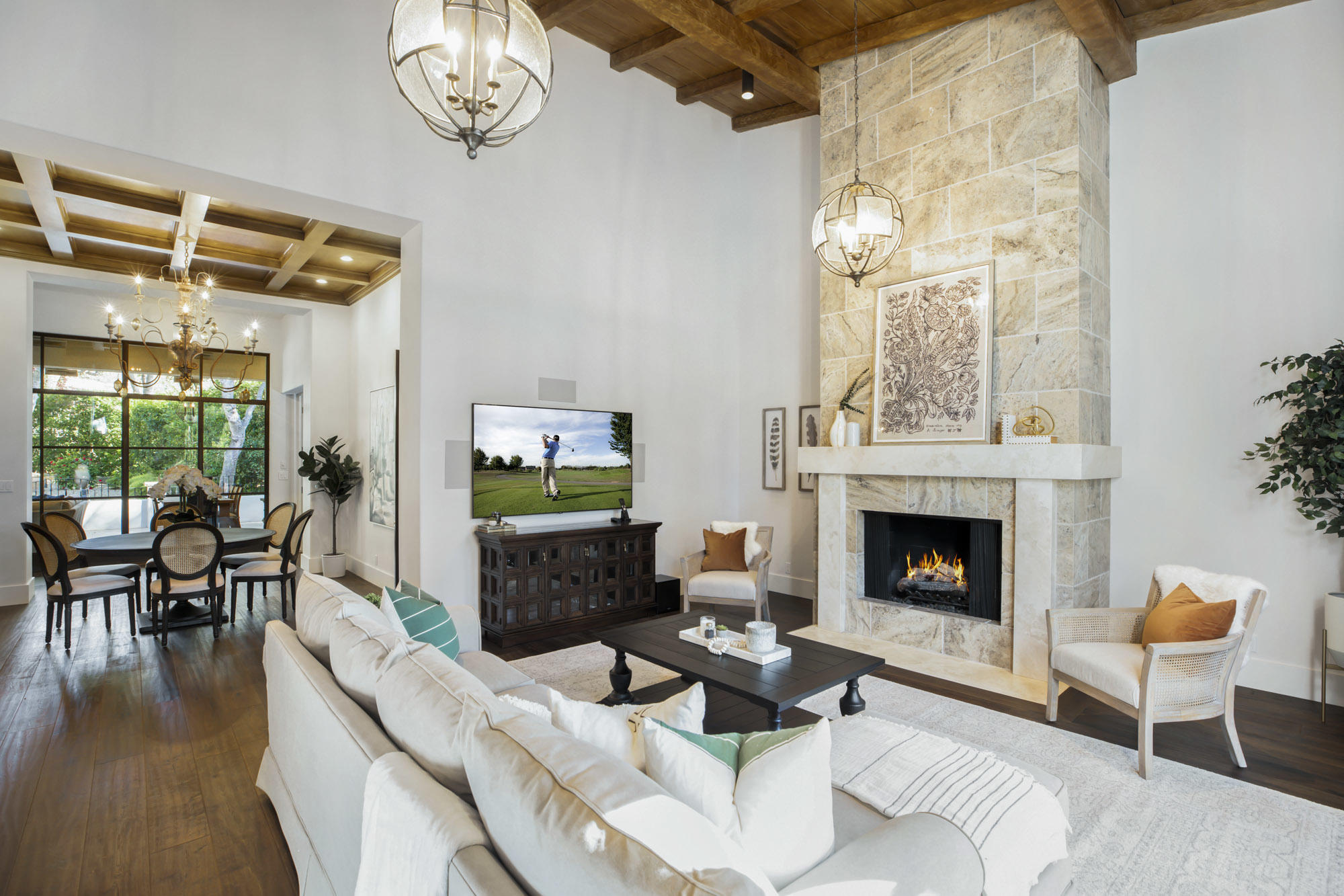 485 Monarch Lane Santa Barbara, CA 93108 - Photo 5 of 24 a living room with furniture a fireplace and a floor to ceiling window