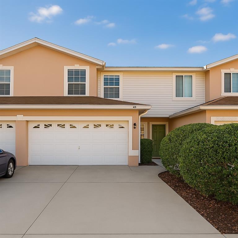 a view of a house with garage