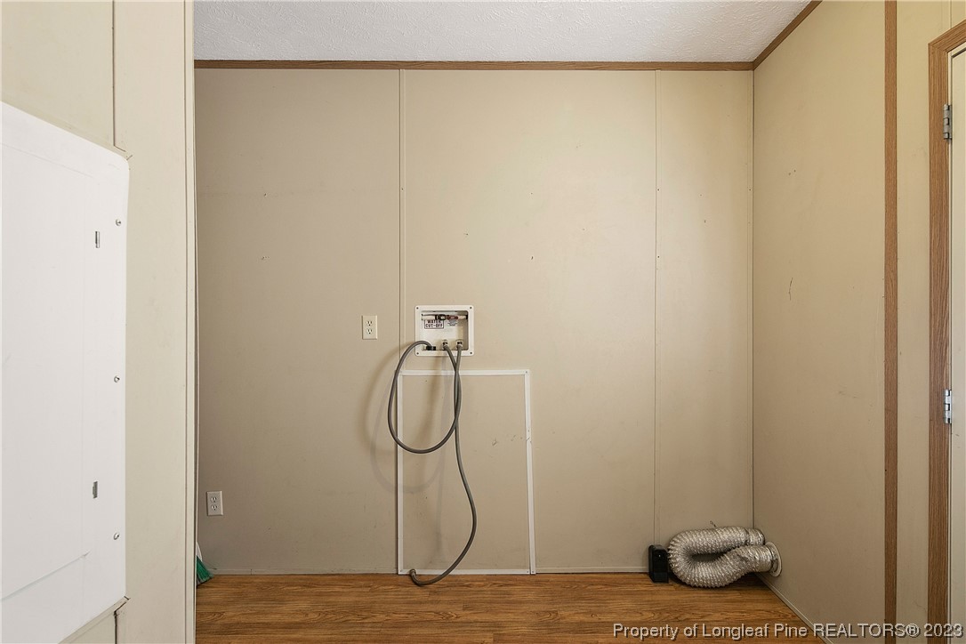 4759 Darroch Road Lillington, NC 27546 - Photo 22 of 50 a view of a room with rack on the wall