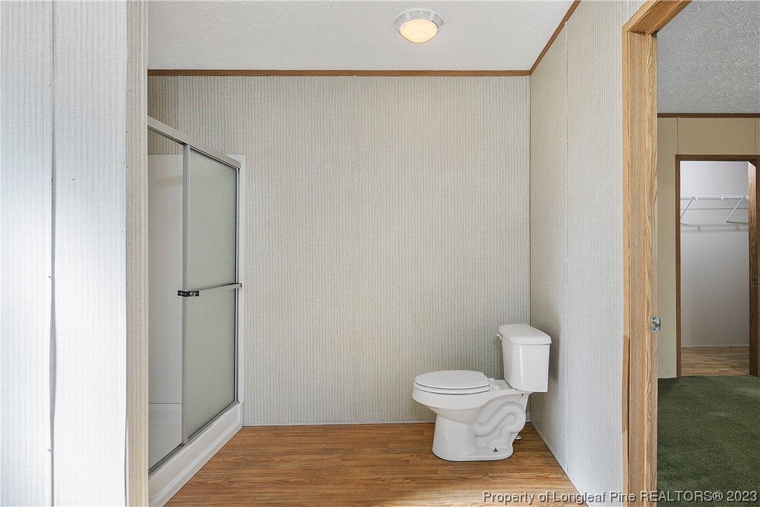 4759 Darroch Road Lillington, NC 27546 - Photo 30 of 50 a bathroom with a toilet