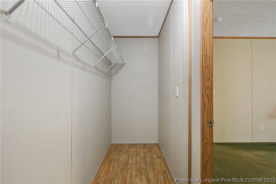 4759 Darroch Road Lillington, NC 27546 - Photo 31 of 50 a view of entryway with wooden floor