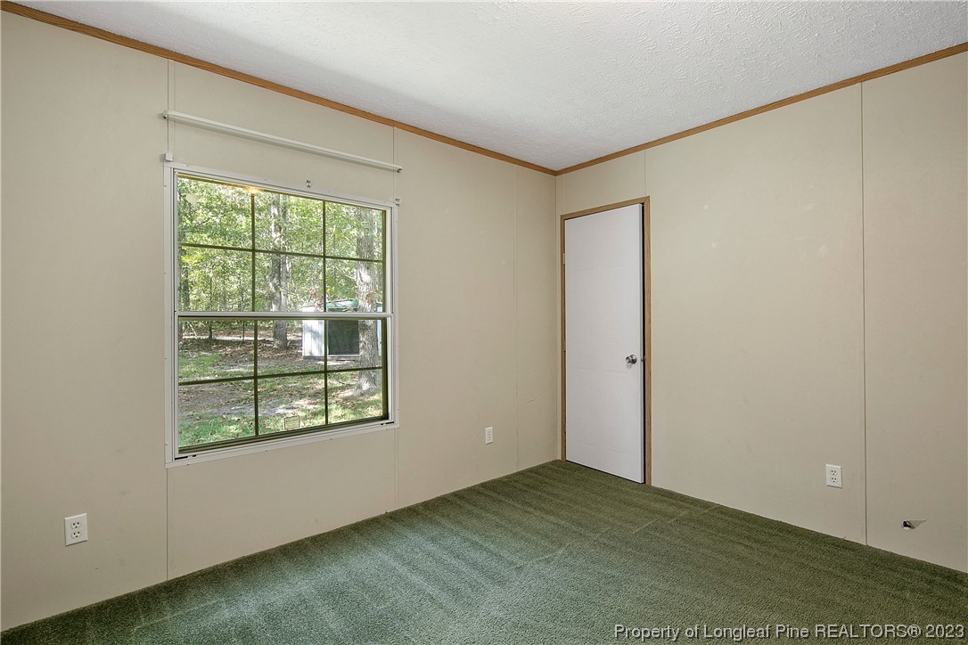 4759 Darroch Road Lillington, NC 27546 - Photo 33 of 50 an empty room with windows