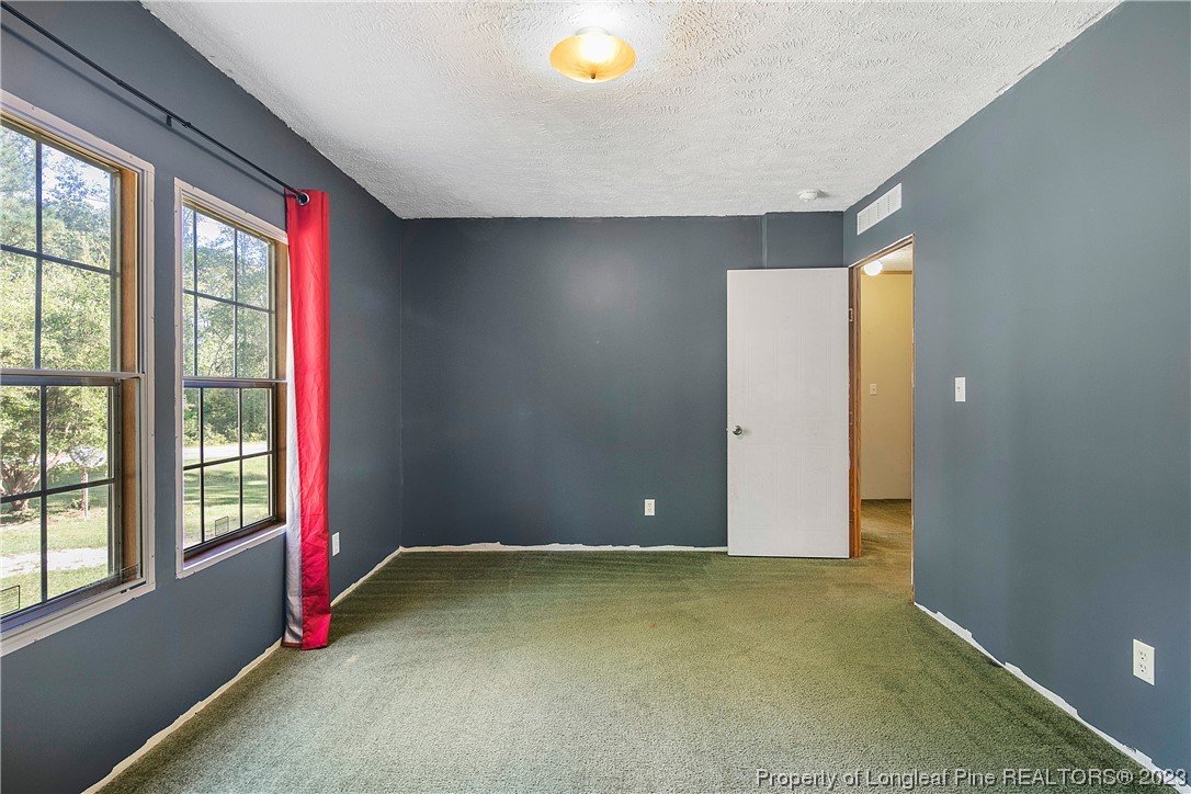 4759 Darroch Road Lillington, NC 27546 - Photo 37 of 50 an empty room with windows