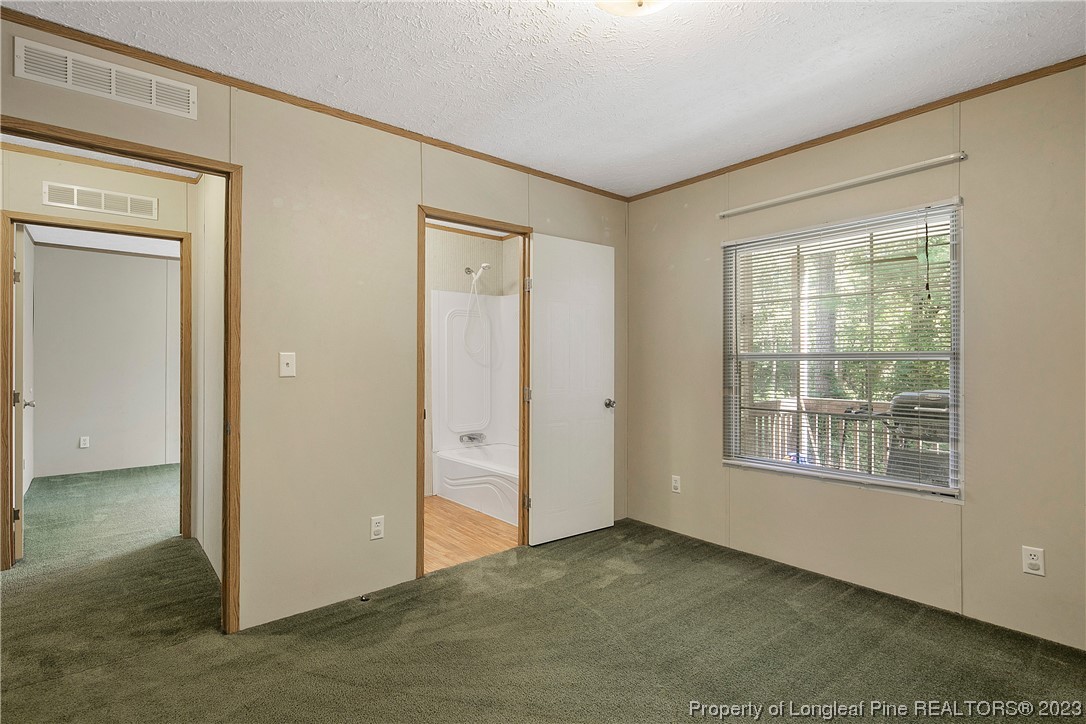 4759 Darroch Road Lillington, NC 27546 - Photo 41 of 50 an empty room with windows
