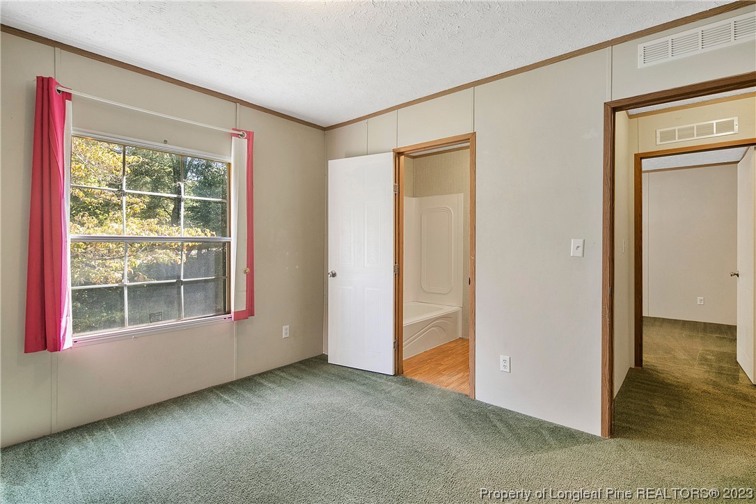 4759 Darroch Road Lillington, NC 27546 - Photo 44 of 50 an empty room with a window