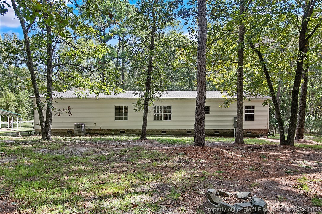4759 Darroch Road Lillington, NC 27546 - Photo 47 of 50 a view of a house with a yard
