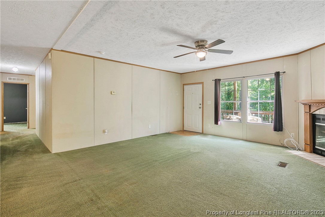 4759 Darroch Road Lillington, NC 27546 - Photo 10 of 50 a view of an empty room with a window