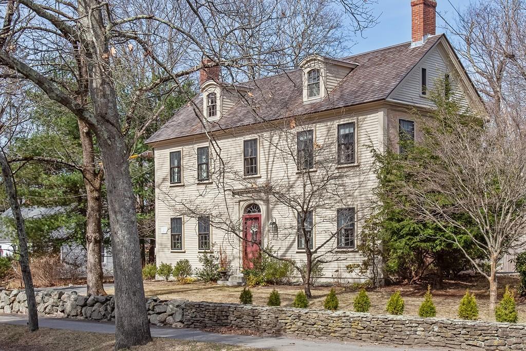 651 Boston Post Road Weston, MA 02493 - Photo 1 of 19 a front view of a house with garden