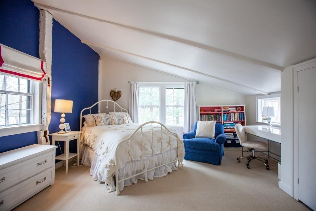 651 Boston Post Road Weston, MA 02493 - Photo 13 of 19 a bedroom with bed and a large window