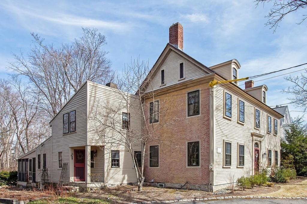 651 Boston Post Road Weston, MA 02493 - Photo 17 of 19 a front view of a building with large windows