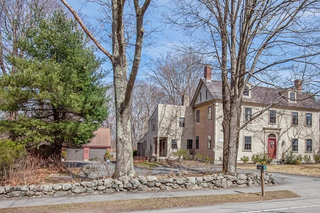 651 Boston Post Road Weston, MA 02493 - Photo 18 of 19 a tree in the middle of a yard