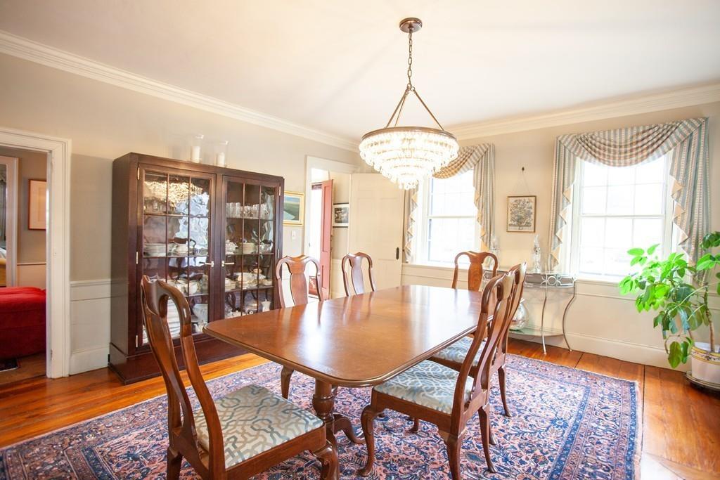 651 Boston Post Road Weston, MA 02493 - Photo 4 of 19 a view of a dining room with furniture window and wooden floor