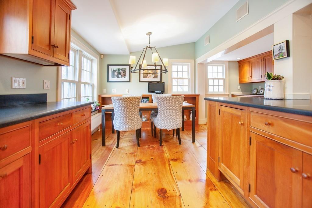 651 Boston Post Road Weston, MA 02493 - Photo 7 of 19 a dining hall with stainless steel appliances granite countertop a granite counter tops and a view of living room