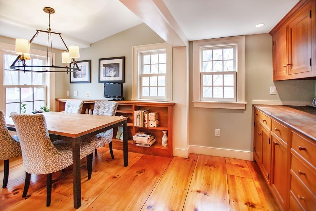 651 Boston Post Road Weston, MA 02493 - Photo 8 of 19 a view of a dining room with furniture window and wooden floor