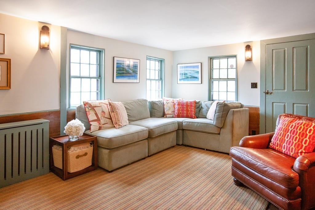 651 Boston Post Road Weston, MA 02493 - Photo 9 of 19 a living room with furniture and a window