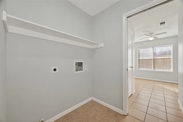 a view of a livingroom with a ceiling fan