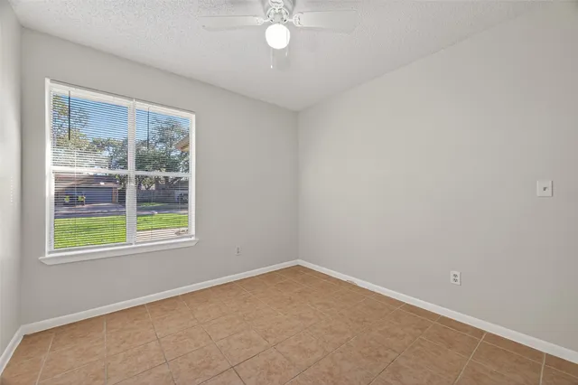 a view of a kitchen with a sink and dishwasher cabinets