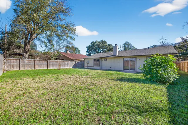 a house view with a garden space