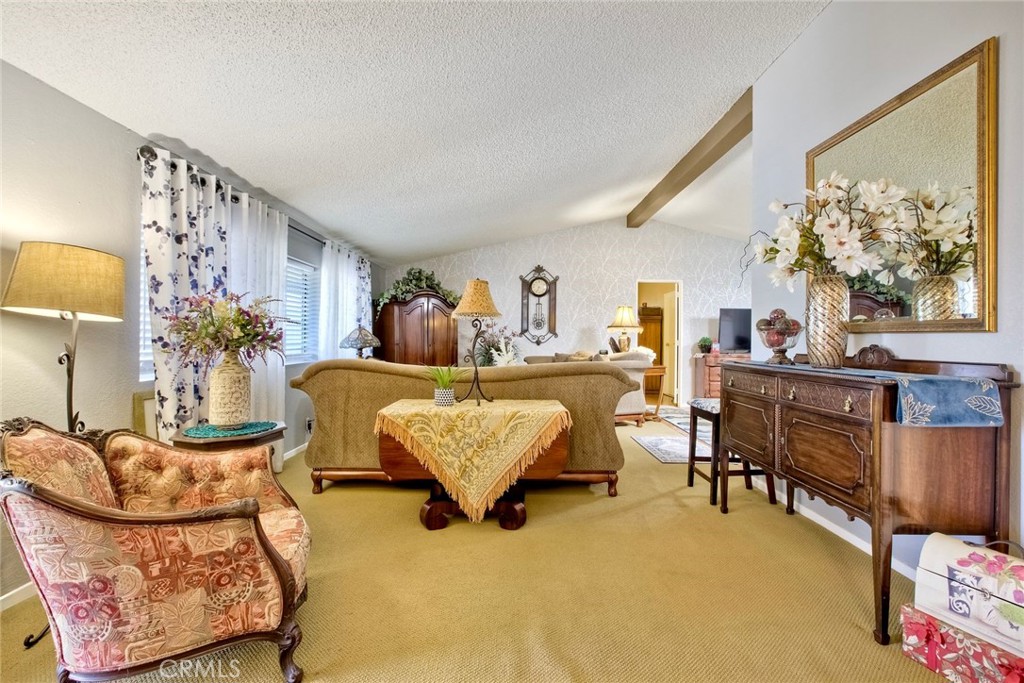 34370 The Farm Road Wildomar, CA 92595 - Photo 11 of 31 a living room with furniture and a large window