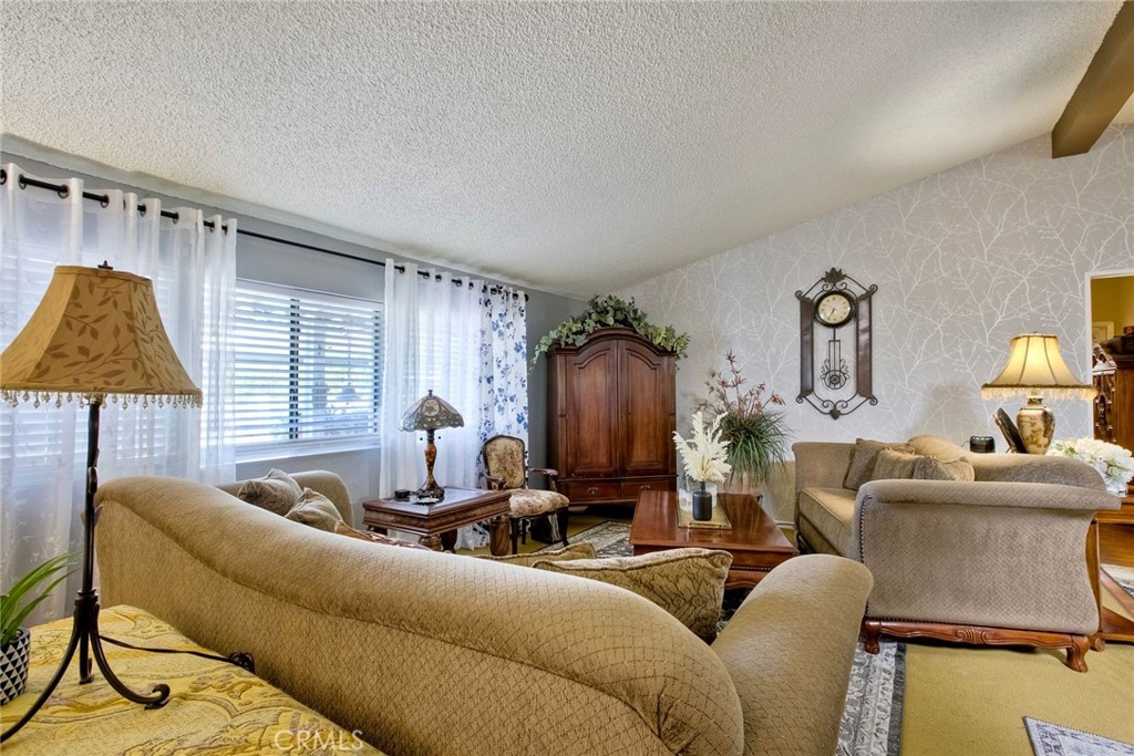 34370 The Farm Road Wildomar, CA 92595 - Photo 12 of 31 a living room with furniture and a window
