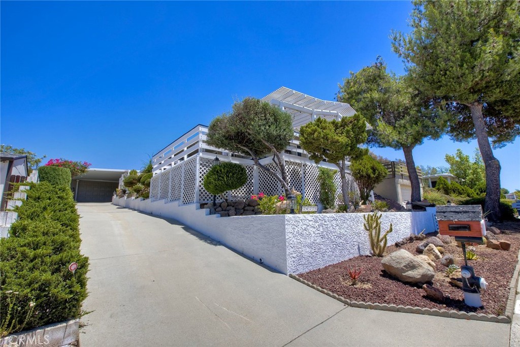 34370 The Farm Road Wildomar, CA 92595 - Photo 2 of 31 a picture of a couple of cars parked on road parking