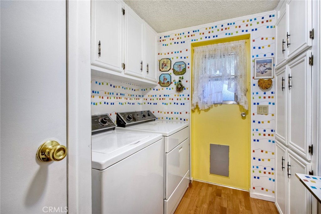 34370 The Farm Road Wildomar, CA 92595 - Photo 24 of 31 a utility room with dryer and washer