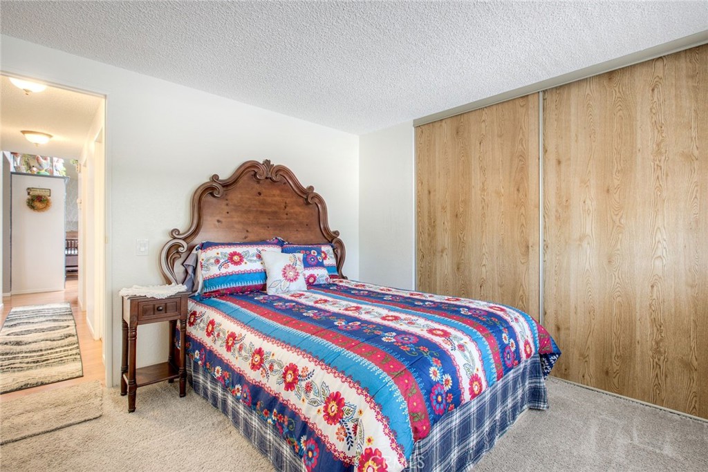 34370 The Farm Road Wildomar, CA 92595 - Photo 26 of 31 a bedroom with a bed and a window
