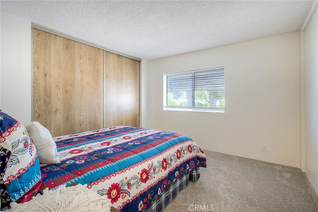 34370 The Farm Road Wildomar, CA 92595 - Photo 27 of 31 a bedroom with a bed and a window