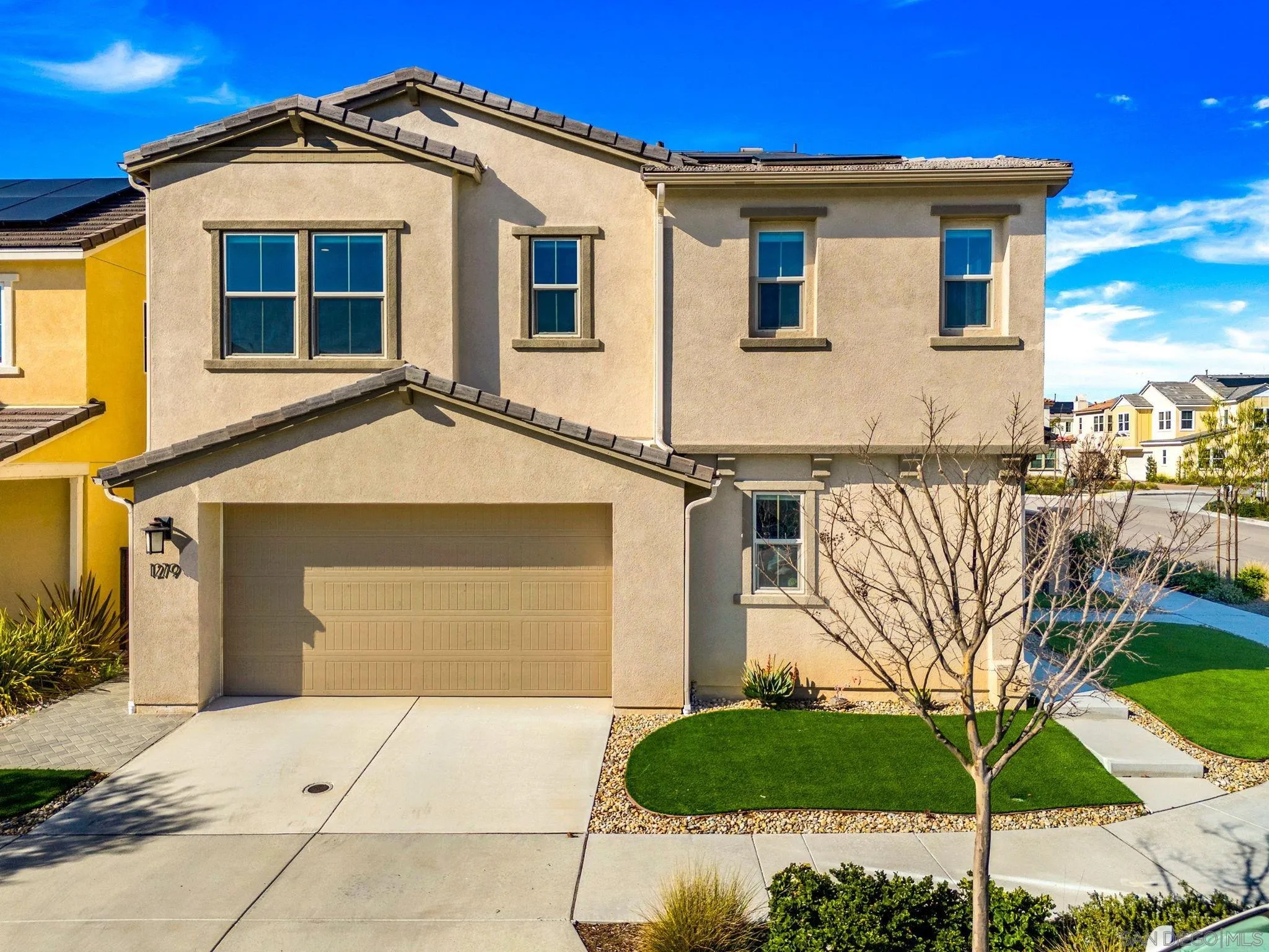 1279 Camino Prado Chula Vista, CA 91913 - Photo 1 of 38 a front view of a house with a yard