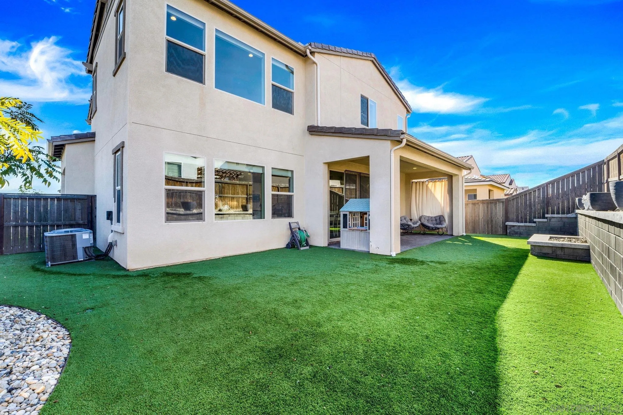 1279 Camino Prado Chula Vista, CA 91913 - Photo 17 of 38 a view of a yard in front of a house