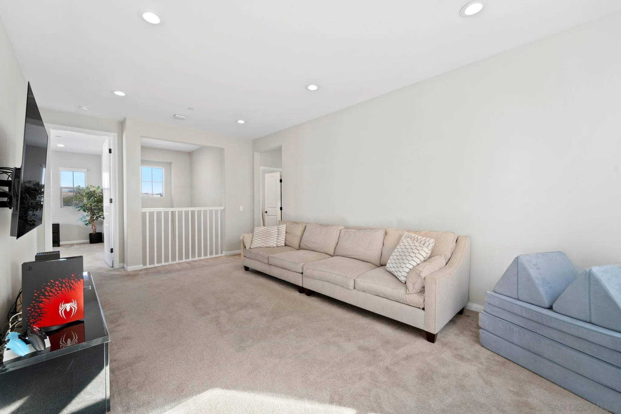 1279 Camino Prado Chula Vista, CA 91913 - Photo 21 of 38 a living room with furniture and a couch