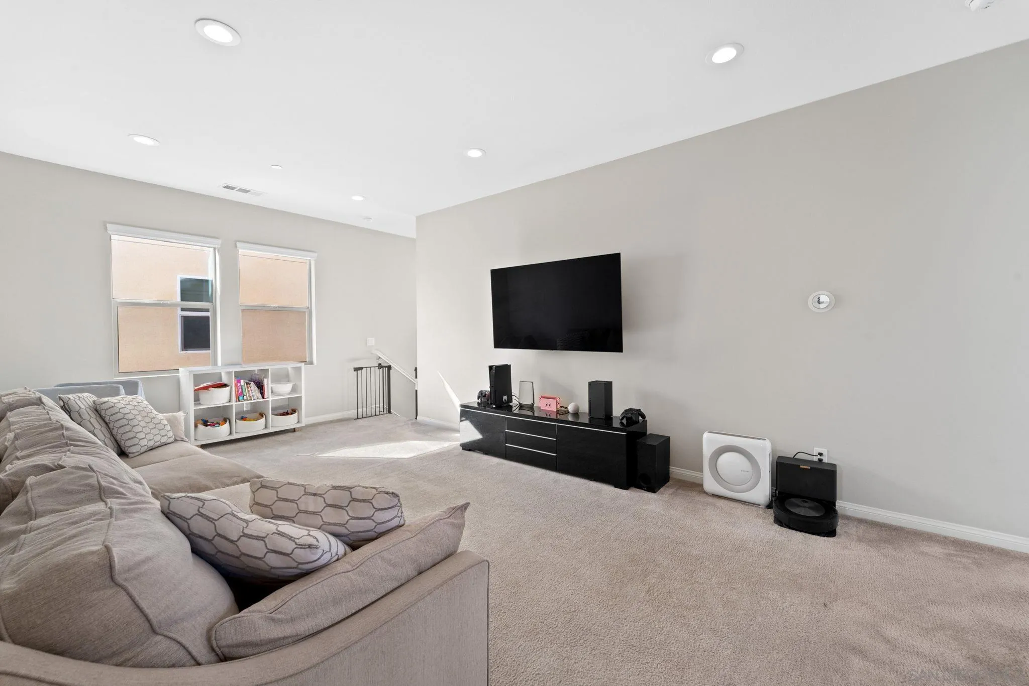 1279 Camino Prado Chula Vista, CA 91913 - Photo 22 of 38 a living room with furniture and a flat screen tv