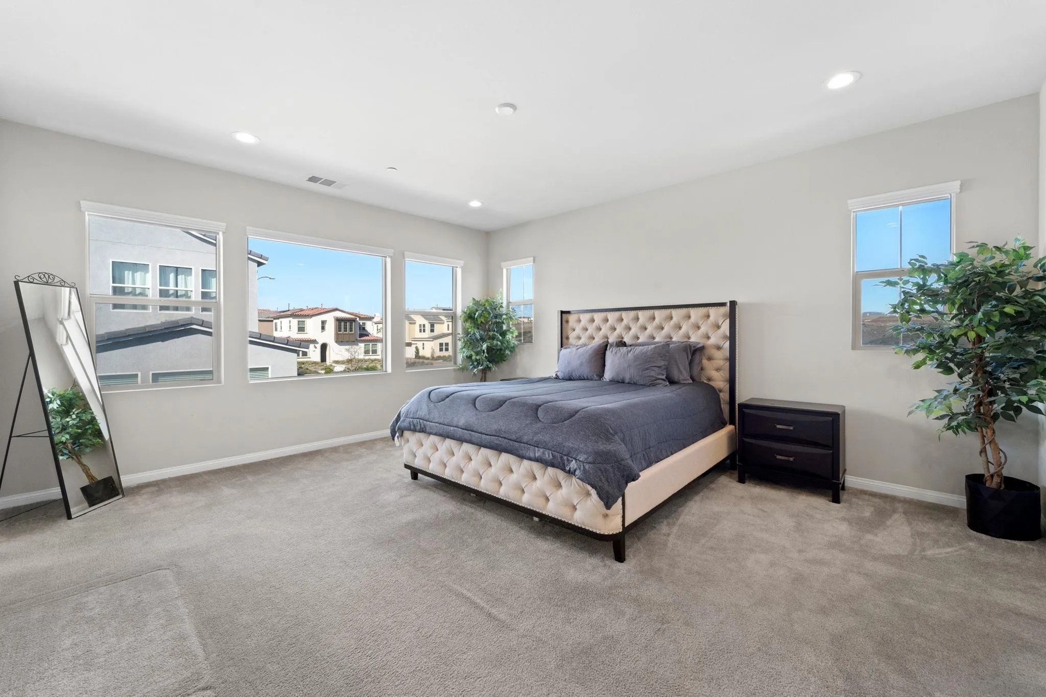 1279 Camino Prado Chula Vista, CA 91913 - Photo 24 of 38 a bedroom with a bed and a couch
