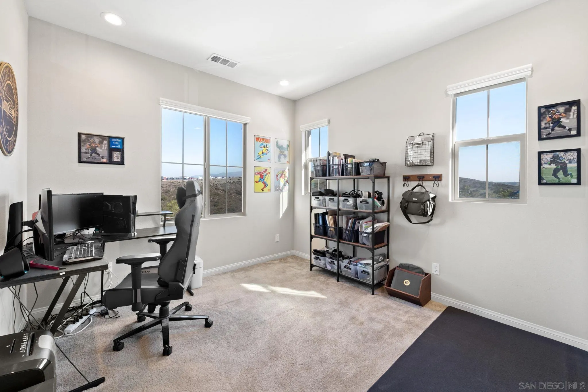 1279 Camino Prado Chula Vista, CA 91913 - Photo 30 of 38 a view of a workspace with furniture and a window