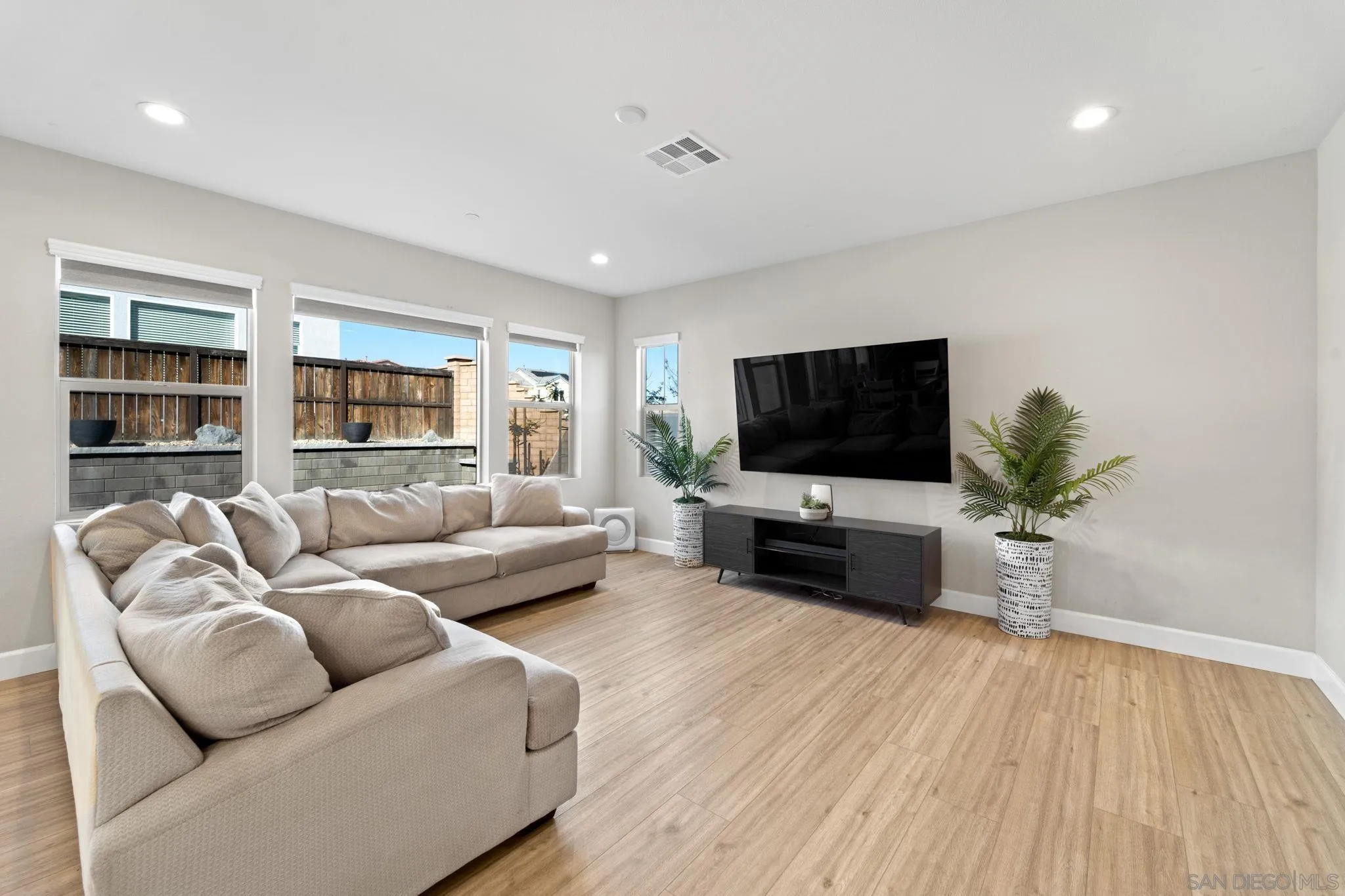 1279 Camino Prado Chula Vista, CA 91913 - Photo 4 of 38 a living room with furniture and a flat screen tv