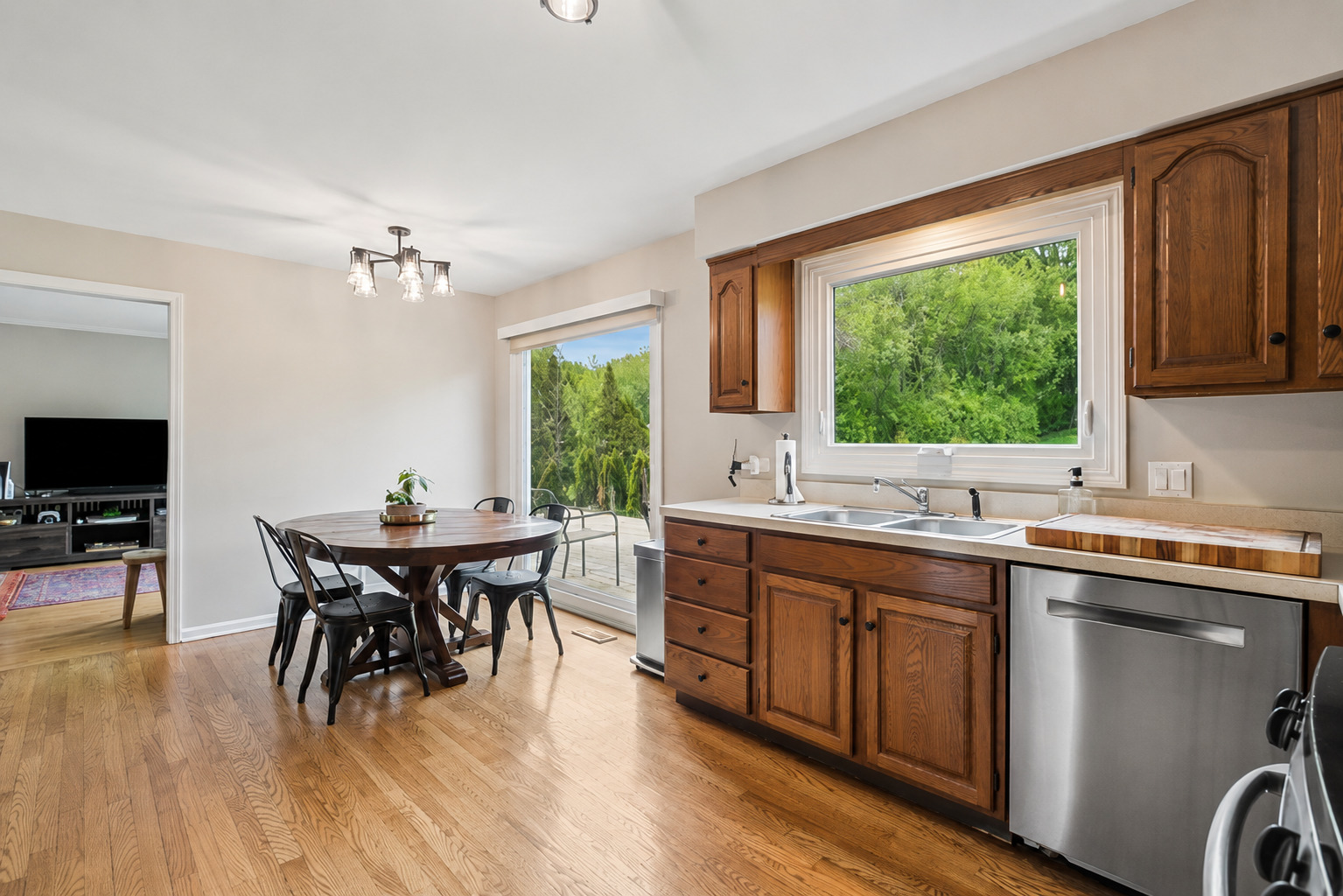 250 Wilshire Road Lake Forest, IL 60045 - Photo 7 of 28 a kitchen with a table chairs sink and cabinets