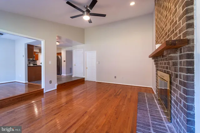 a view of a livingroom with wooden floor