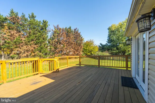 a view of a balcony with an ocean