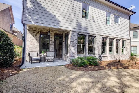 a view of a house with patio