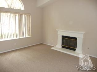 2409 Grapevine Drive Oxnard, CA 93036 - Photo 2 of 4 an empty room with fireplace