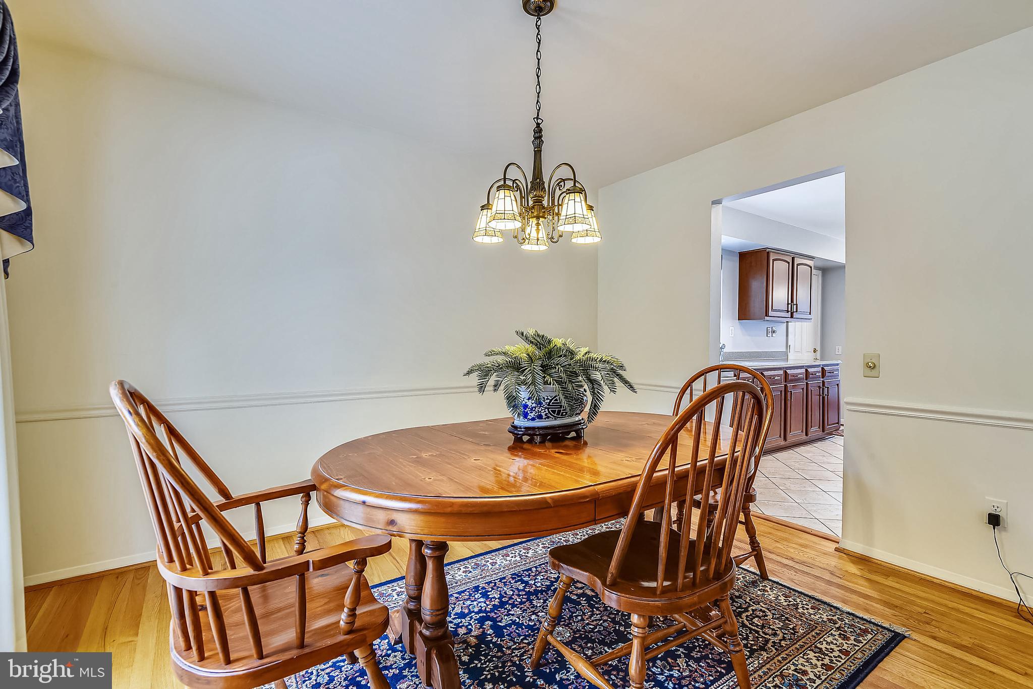2232 Countryside Drive Silver Spring, MD 20905 - Photo 15 of 72 DINING ROOM WITH DIMMER LIGHTING & CHAIR RAILING