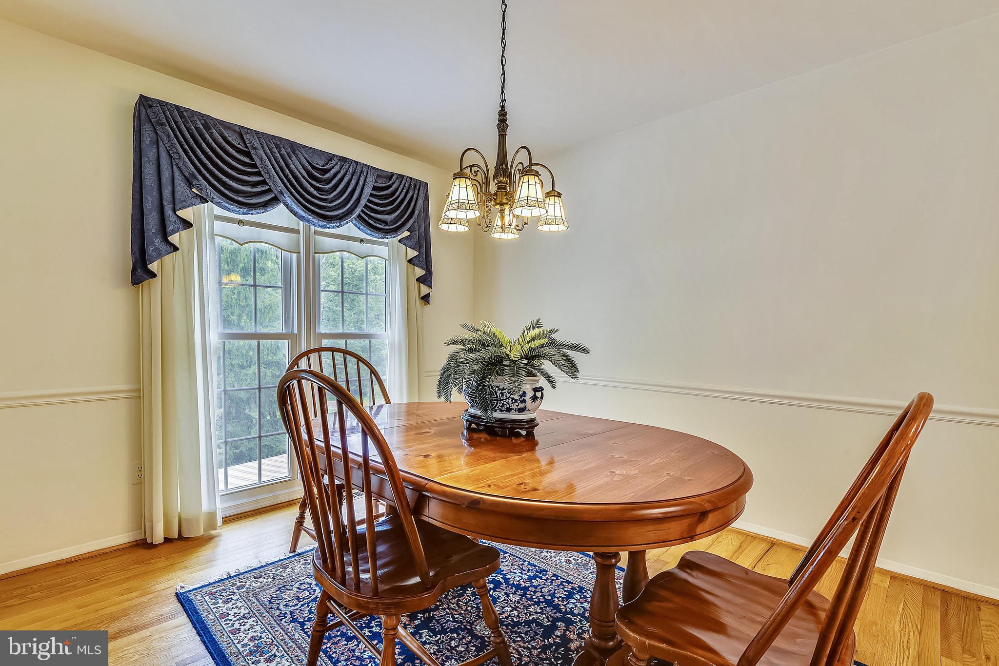 2232 Countryside Drive Silver Spring, MD 20905 - Photo 16 of 72 DINING ROOM WITH CUSTOM WINDOW TREATMENT