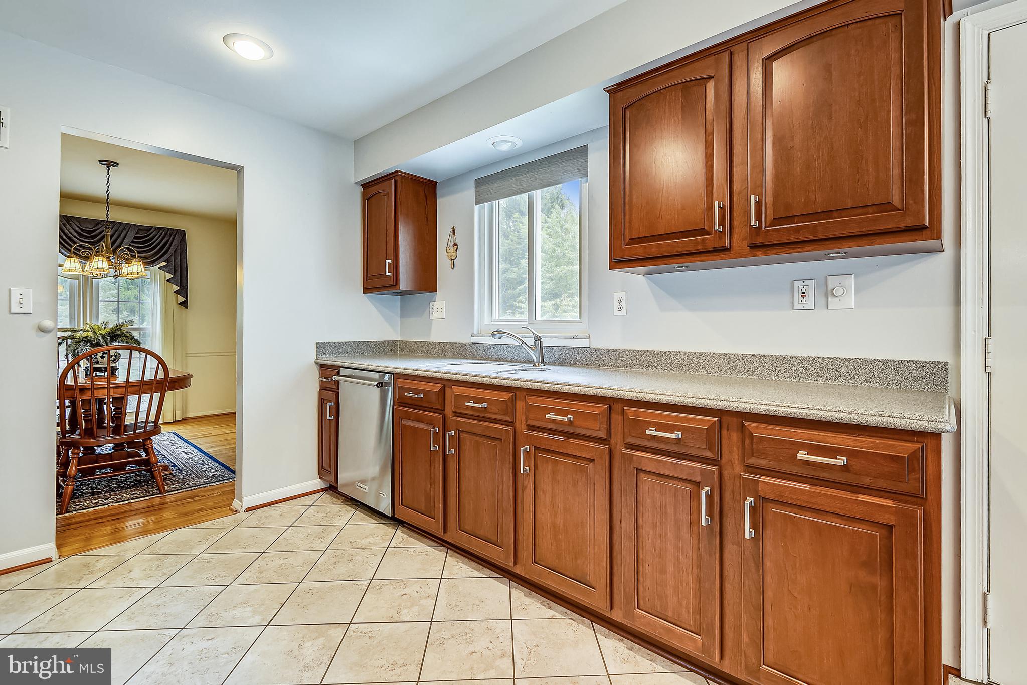 2232 Countryside Drive Silver Spring, MD 20905 - Photo 18 of 72 SPACIOUS UPDATED KITCHEN WITH CORIAN COUNTERTOPS