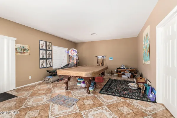 a room with furniture and window